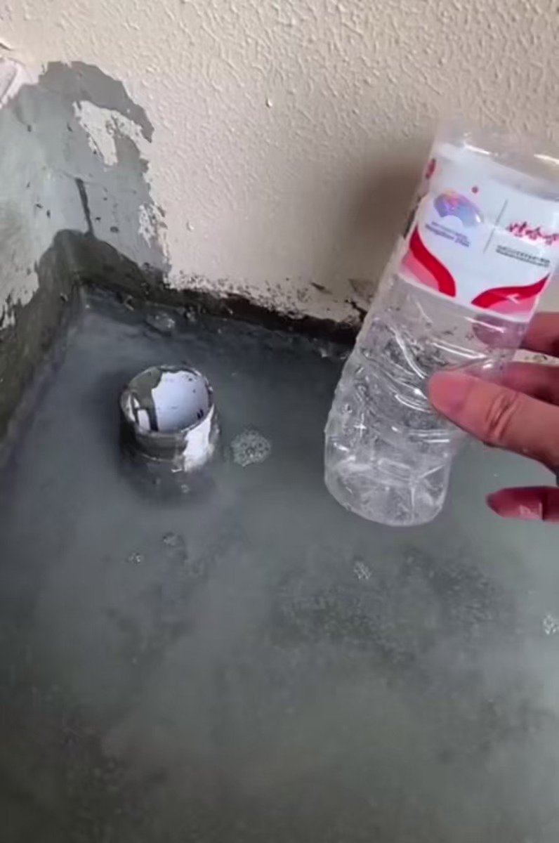 draining water… with a bottle?
