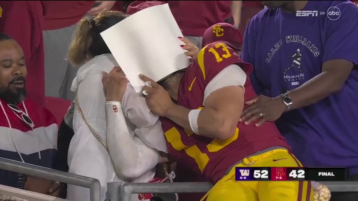 An emotional Caleb Williams with his family after the loss to Washington: