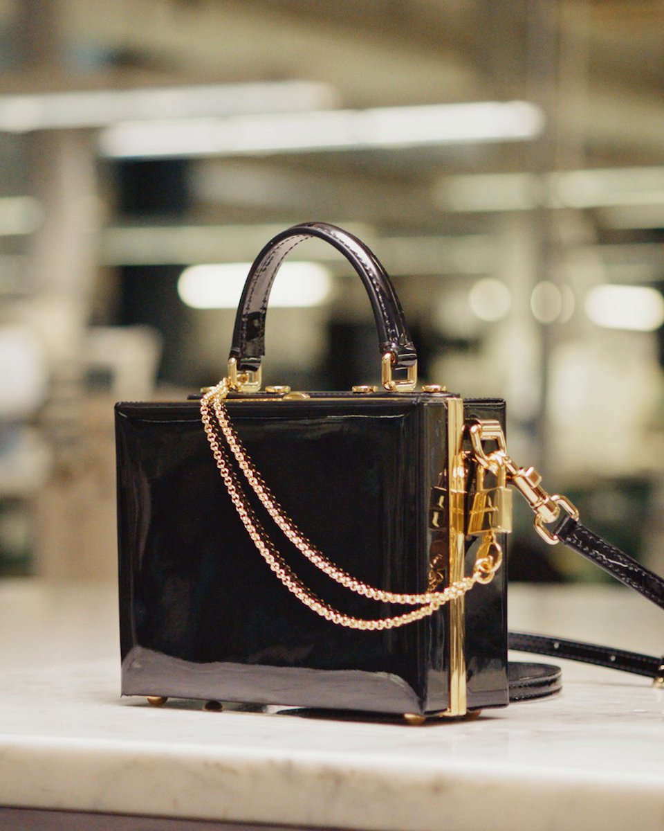 Carry the elegance of #DGFattoAMano, witness the craftsmanship behind the creation of the #DGDolceBox. Expert artisans meticulously handcraft every detail. A testimony of the art in every #DolceGabbana creation. Discover the art of #MadeinItaly at