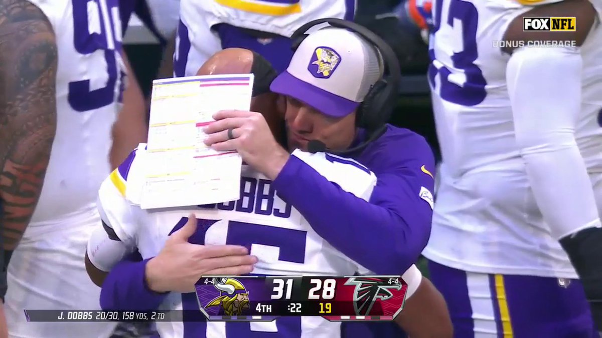 Josh Dobbs and Kevin O'Connell embrace after the Minnesota Vikings go-ahead touchdown!