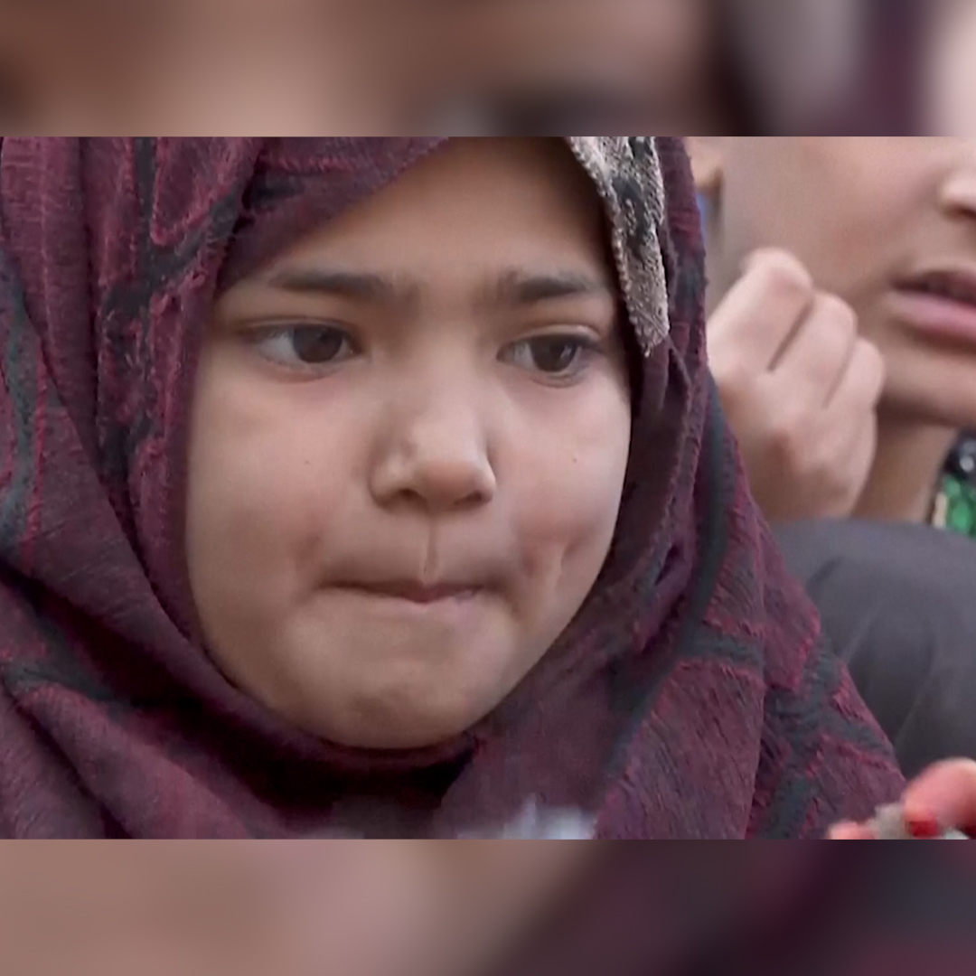This 7-year-old girl and her family are among thousands of Afghans fleeing Pakistan's mass deportation drive. Now they are stuck at the border with little food or shelter.