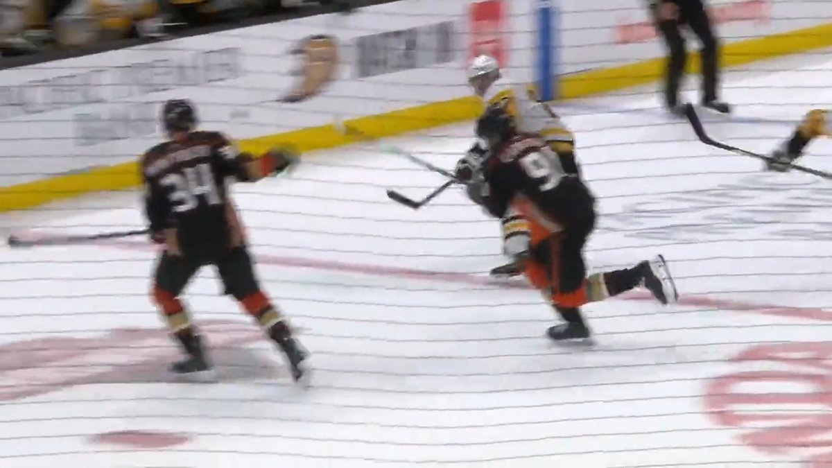 Did Crosby just score a backhand goal from center ice with the puck in the air? Yes, yes he did.