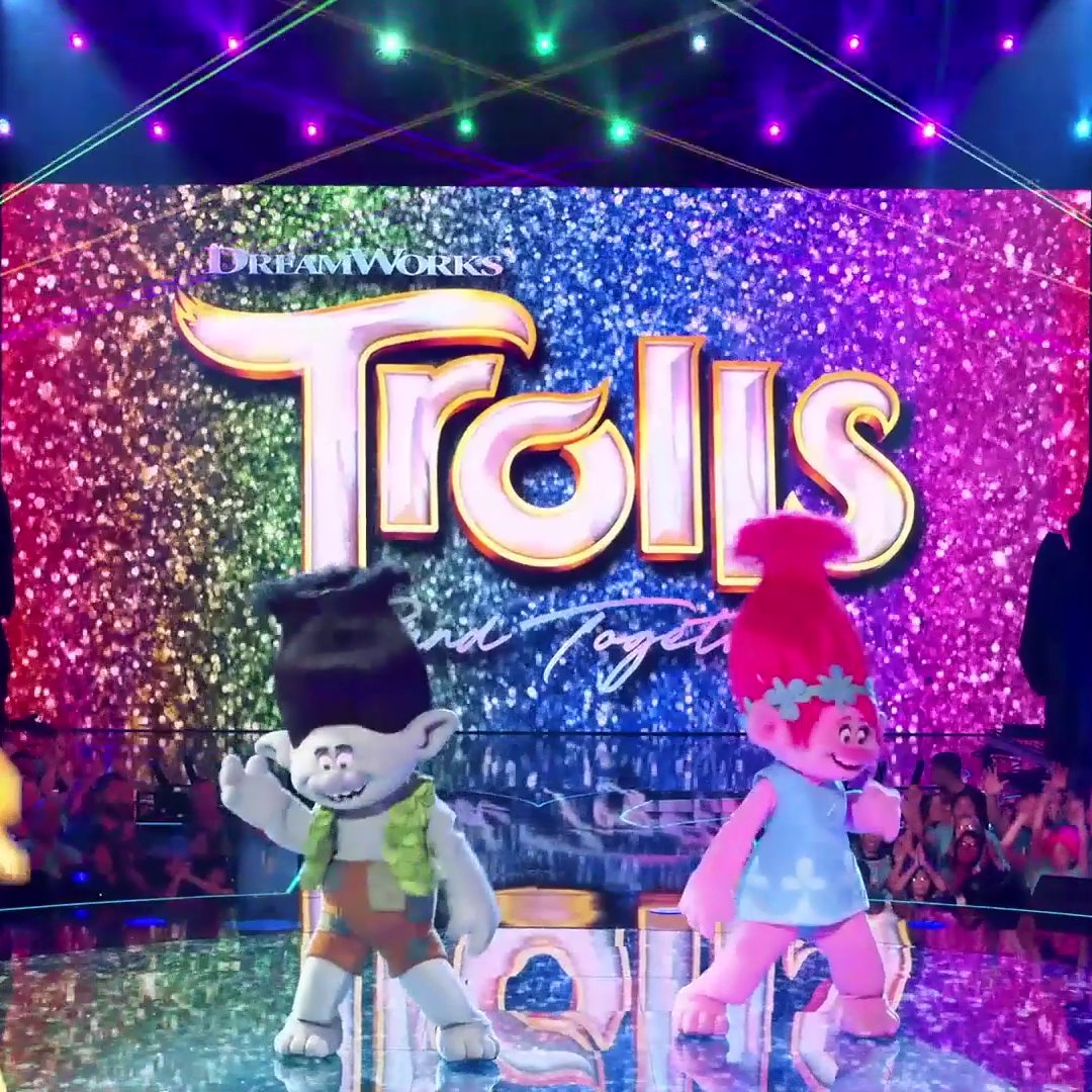 Welcome to #TheMaskedSinger stage, Poppy and Branch! 💗 Don’t miss #TrollsBandTogether in theaters November 17. #ad