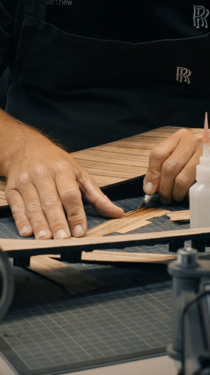 Spectre's coach doors are the largest of any Rolls-Royce, serving as the ultimate canvas for Canadel Panelling. Each door panel undergoes meticulous hand-refinement, ensuring a flawless finish. Discover: #RollsRoyceSpectre
