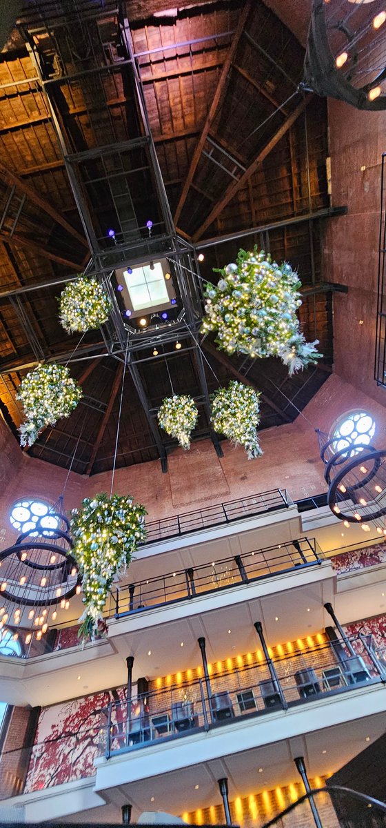 ALERT: The Liberty Hotel has installed fully decorated upside-down Christmas trees suspended from its 90-foot rotunda ceiling for the holiday season. 💚