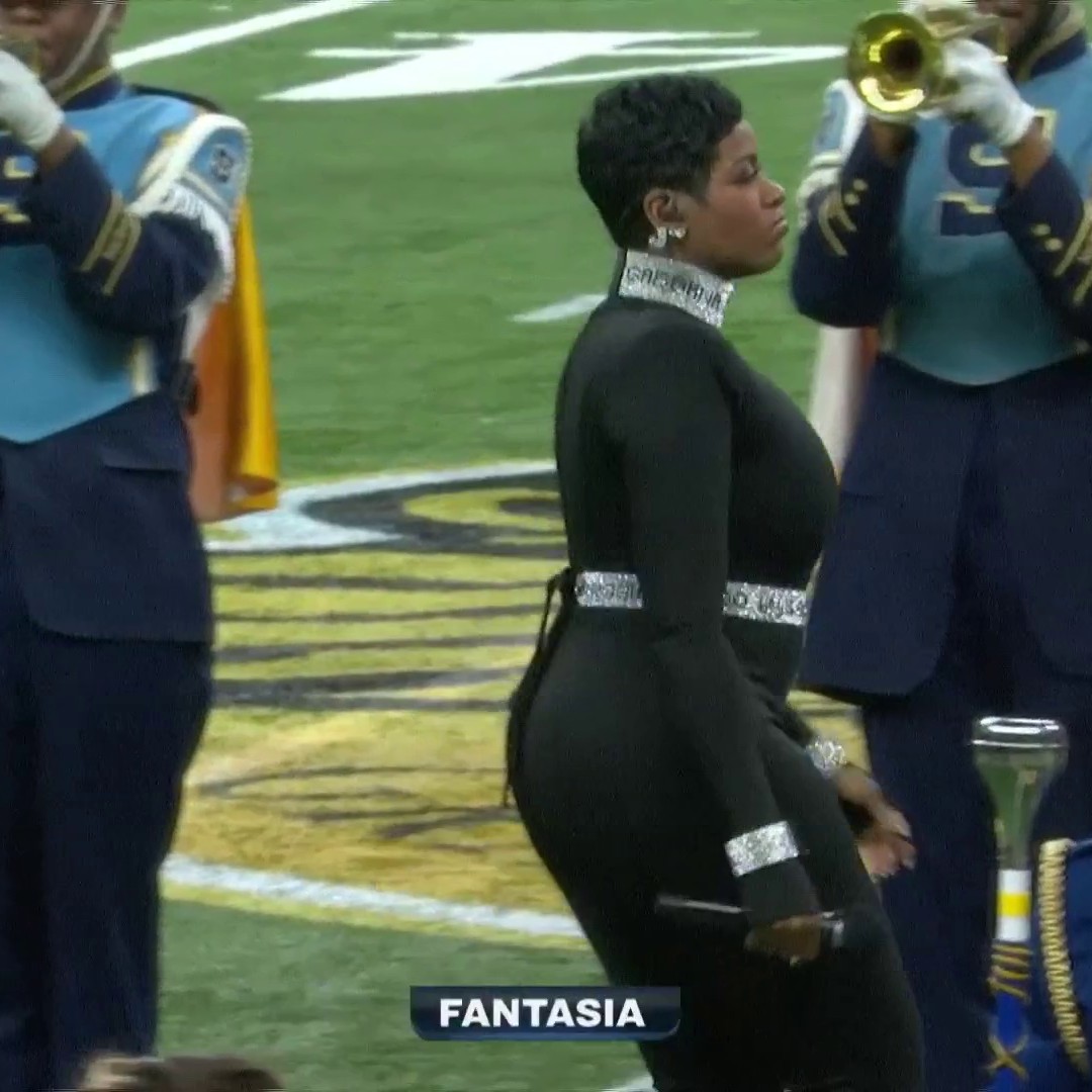 Fantasia Barrino and the Southern University marching band perform at the Bayou Classic halftime show.
