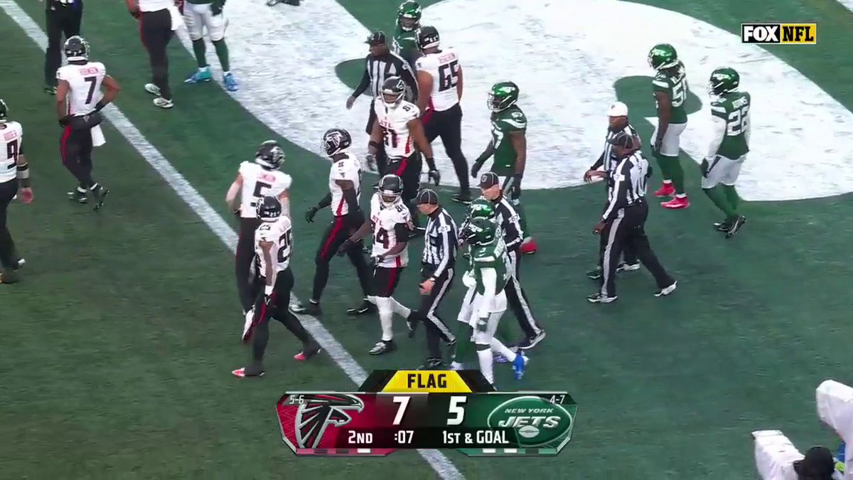 Some exchanges between Falcons and Jets players after an unnecessary roughness penalty on New York.
