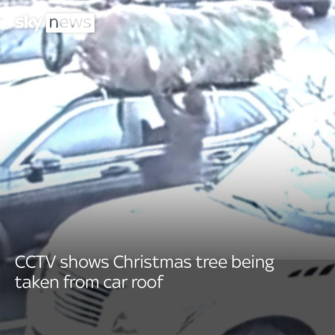 Footage from a car park in California shows a motorist pull up alongside another vehicle, uncouple the Christmas tree on its roof and drive away with it. More here: