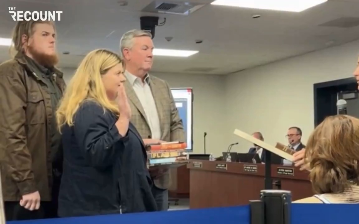 Karen Smith, the new Central Bucks school board president in Pennsylvania, was sworn in Monday not on a Bible — but on a stack of frequently banned books.