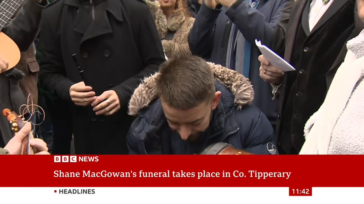 Pogues fans take part in a singalong of Dirty Old Town in central Dublin ahead of Shane MacGowan's funeral procession Follow our live coverage