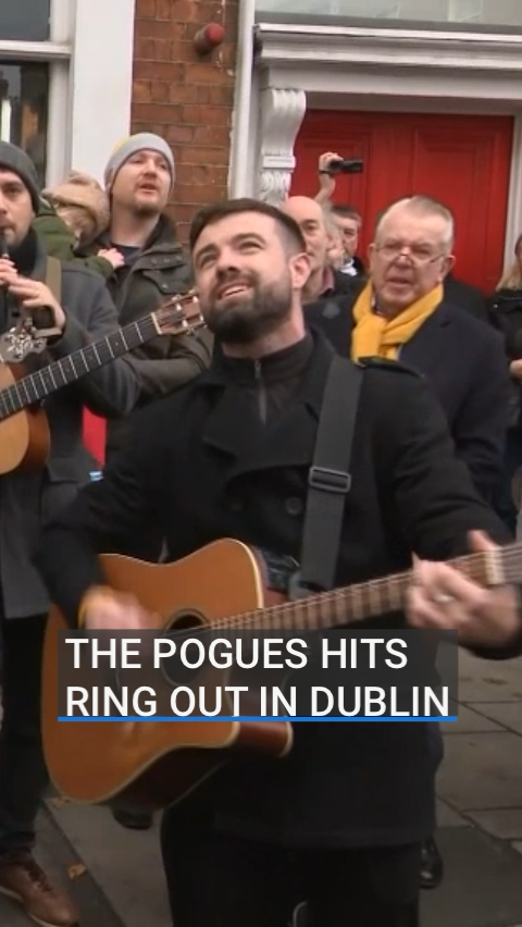Thousands of people turned out in Dublin to pay their respects as Shane MacGowan's coffin was carried in a glass coach along streets close to where he had lived. Members of the public took part in impromptu singing of some of The Pogues biggest hits |
