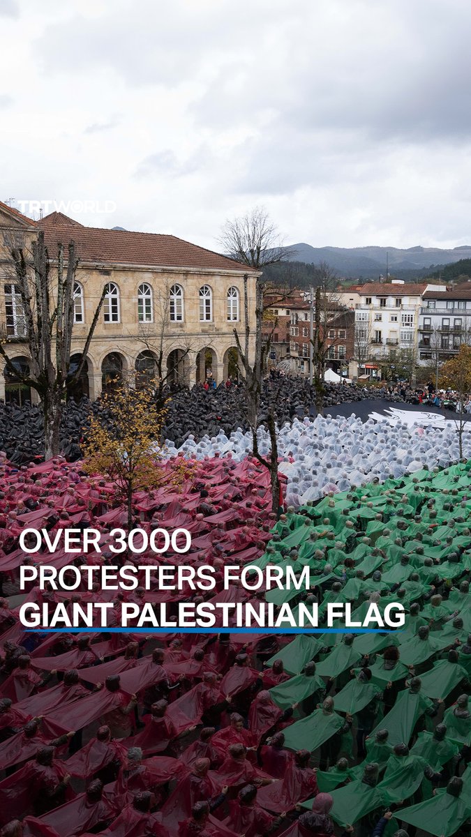 Thousands of pro-Palestine Protesters in Northern Spain create a massive mosaic of Palestinian flag!
