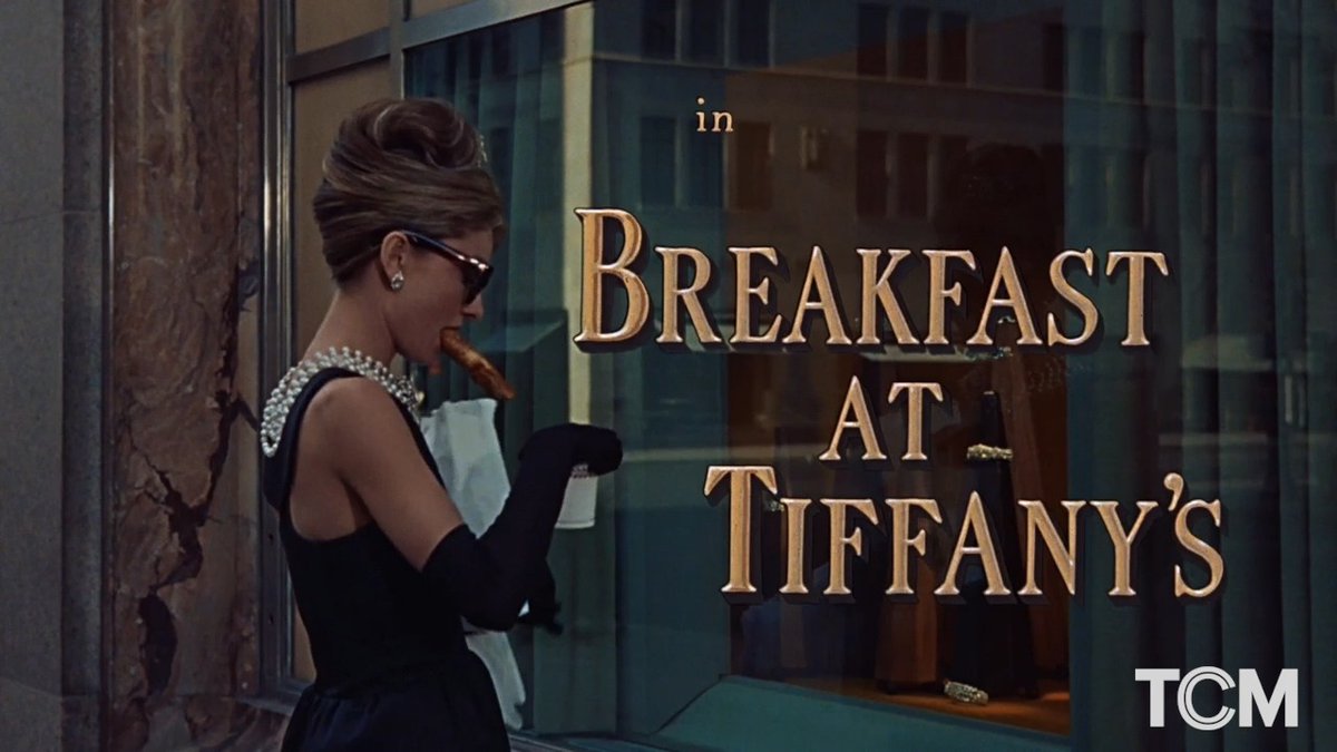 Although not visible on camera, hundreds of onlookers watched Audrey Hepburn film this iconic opening scene in BREAKFAST AT TIFFANY'S ('61). The signature Givenchy dress she wears sold at auction for over $900K in 2006.
