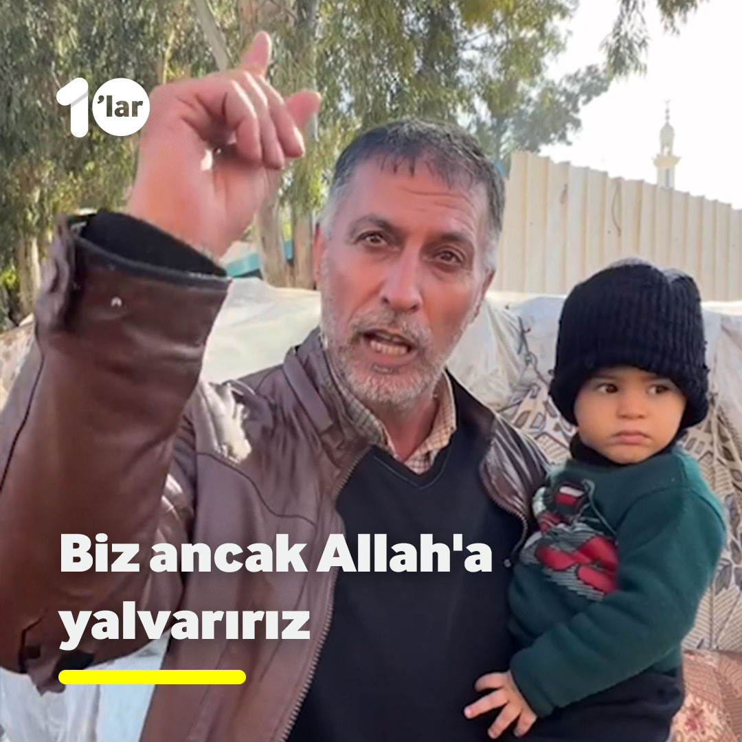 "Biz kimseye yalvarmıyoruz. Ancak Allah'a yalvarıyoruz..." Dünyaya, kucağındaki torunu ile seslendi.