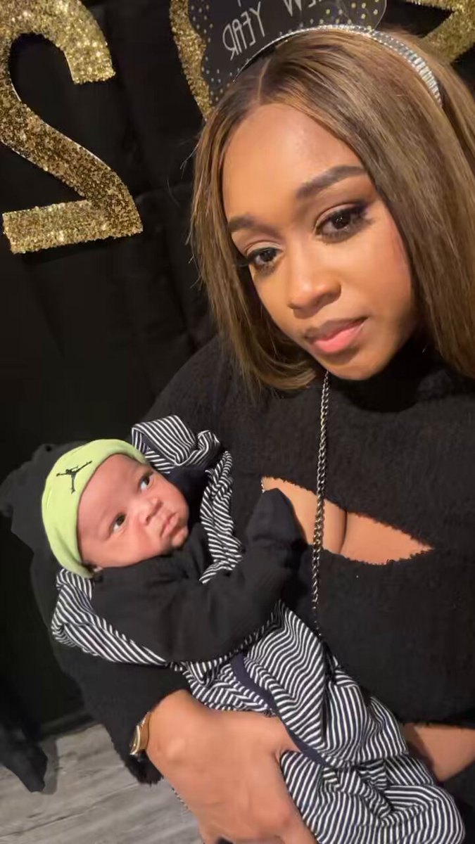 When you only been here 30 days &amp; your mama have you at a NYE party instead of in the bed….happy new year from us🫤