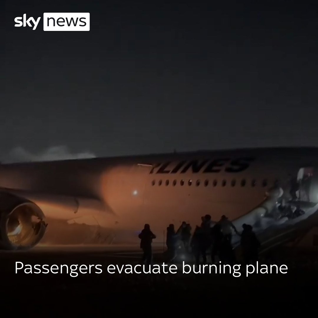 This video footage shows passengers evacuating a Japan Airlines plane as it caught fire on the runway at Tokyo's Haneda airport. Latest: