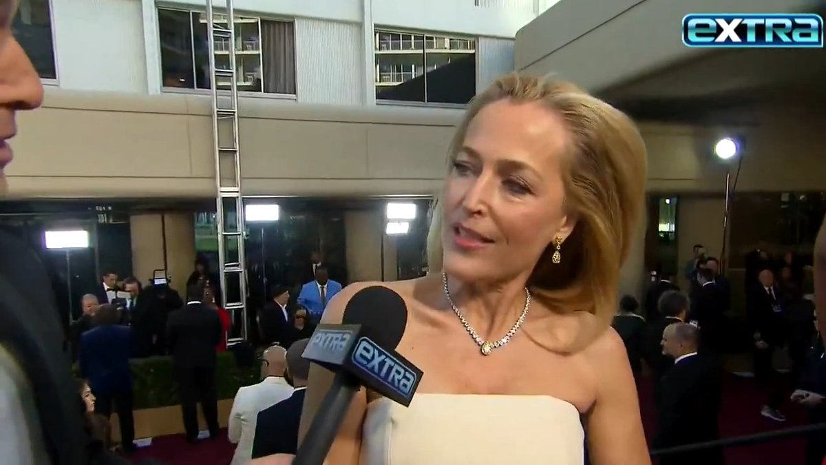 Gillian Anderson (Gillian Anderson) dishes on her special #GoldenGlobes gown that's covered with yonis!