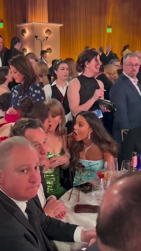 .Taylor Swift chats with Selena Gomez during a break at the 2024 #GoldenGlobes