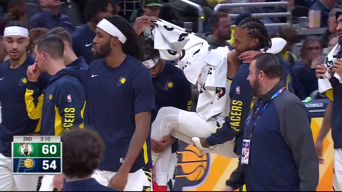 Tyrese Haliburton was carried off the floor by his teammates after slipping and taking an awkward fall in the second quarter of tonight's game.