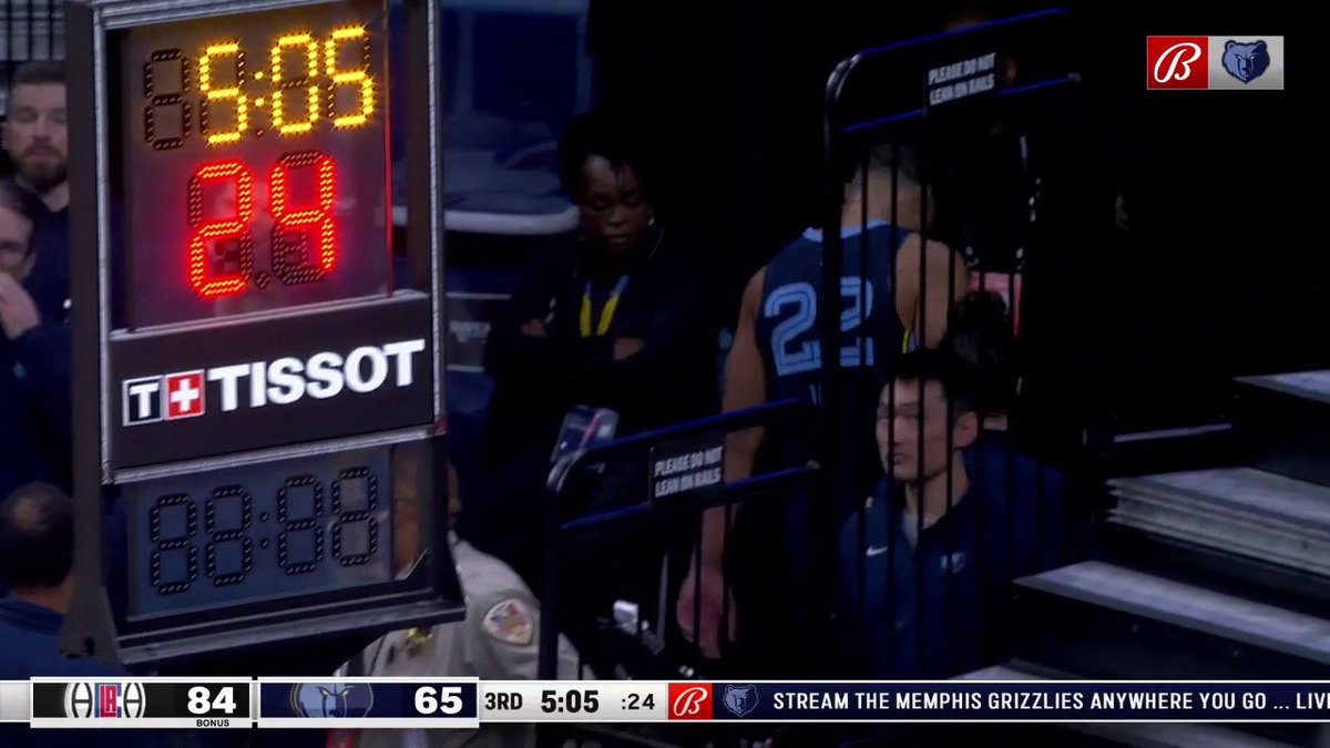Desmond Bane leaving the court after suffering an ankle injury.