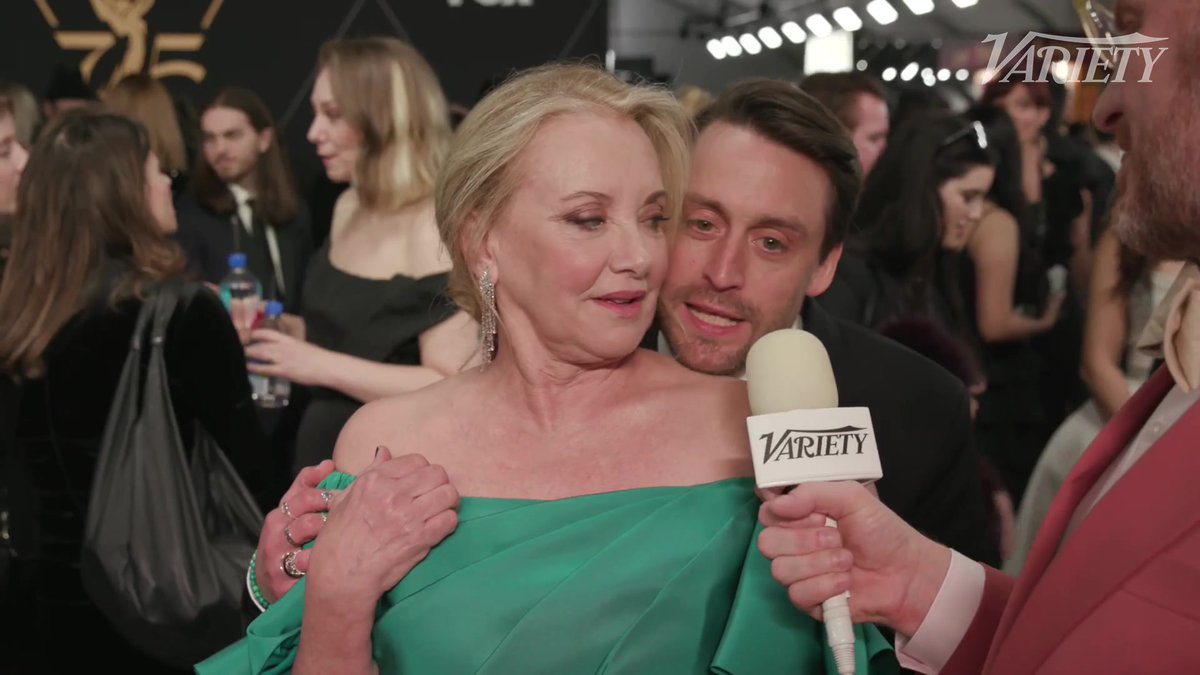 "You really hate me, don't you?" Kieran Culkin interrupts J. Smith-Cameron's interview, and the two share a kiss at the #Emmys.