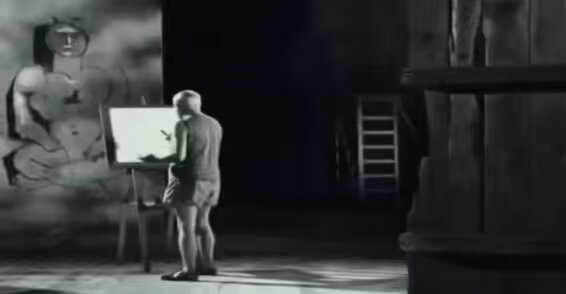 Pablo Picasso draws a face in France in 1956.