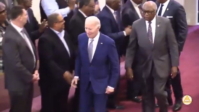 Biden shuffles into church about 15 minutes after the service started in Columbia, South Carolina