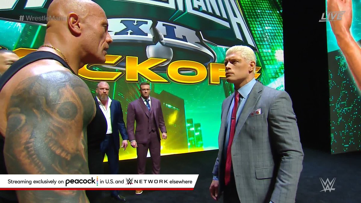 OH IT'S GOING DOWN. 🫢 Dwayne Johnson just slapped Cody Rhodes at the #WrestleMania XL Kickoff.
