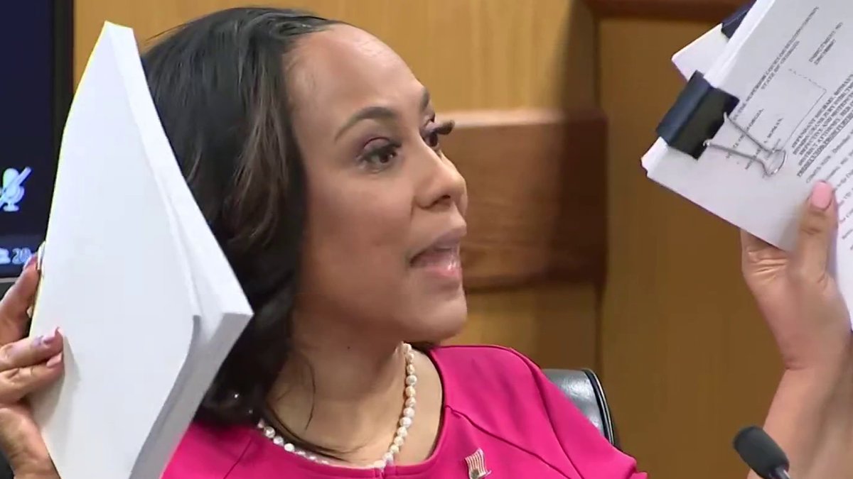 "It is a lie!" Fani Willis accuses defense attorney Merchant of lying, while holding up the motion to disqualify.