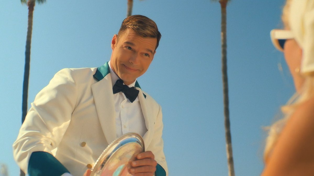 Ricky Martin is Robert, a man of many talents, a keeper of many secrets, and the mixologist behind the meanest Grasshopper in Palm Beach. Palm Royale premieres March 20 on Apple TV+