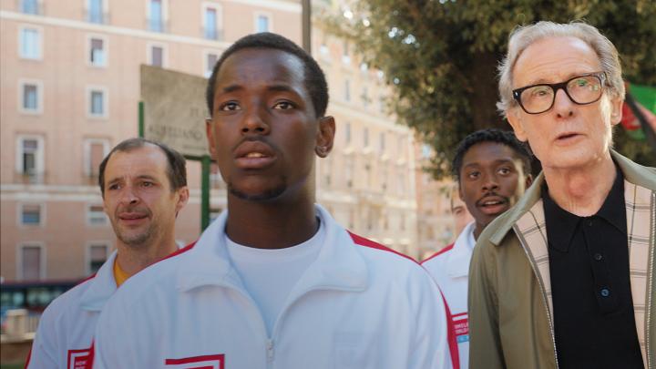 Micheal Ward and Bill Nighy star in The Beautiful Game – a new film based on the Homeless World Cup, coming 29 March.