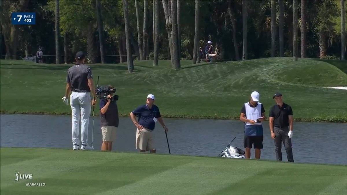 Rory McIlroy, Jordan Spieth and Viktor Hovland discuss McIlroy's drop on No. 7. Rory makes double bogey to move from solo leader to T2.