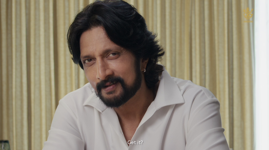 ಕಿಚ್ಚ ಸುದೀಪ್ ಯಾಕ್ ಆ ಇಡ್ಲಿ ಬೇಡ ಅಂದ್ರು ಅರ್ಥ ಆಯ್ತಾ? Understood why Kichcha Sudeepa didn’t want that Idli? 😉 You’ll know on the #RCBUnbox event day! Stay tuned… #PlayBold #ArthaAytha #ನಮ್ಮRCB