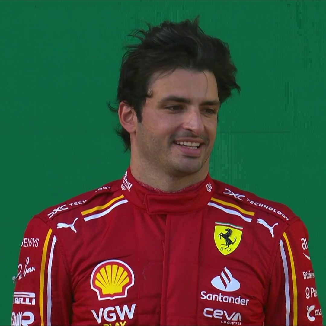 The smile on the face of Carlos Sainz and the Ferrari team as the Italian national anthem belts out in Melbourne 🇮🇹🇦🇺