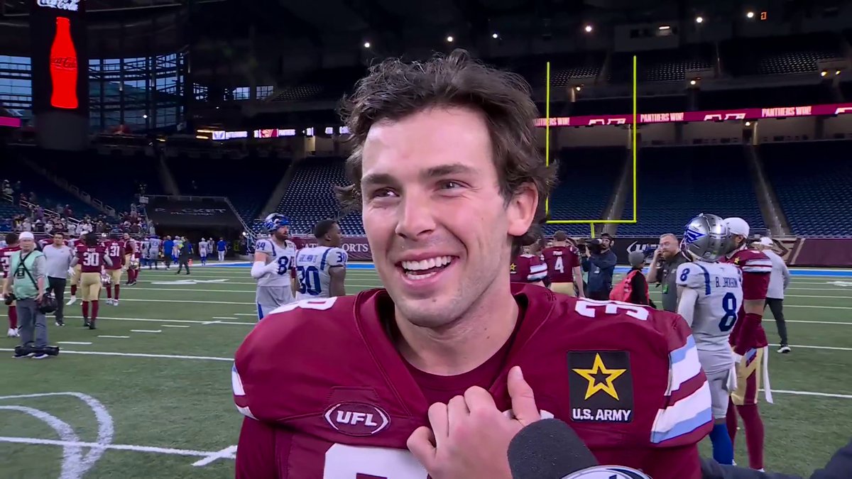 The star kicker, Jake Bates, talks with Jake Butt after his 64-yard field goal led to a Michigan Panthers win!
