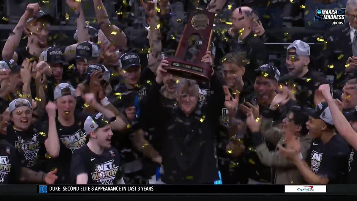 The Boilermakers hoist the regional trophy! Purdue Men's Basketball
