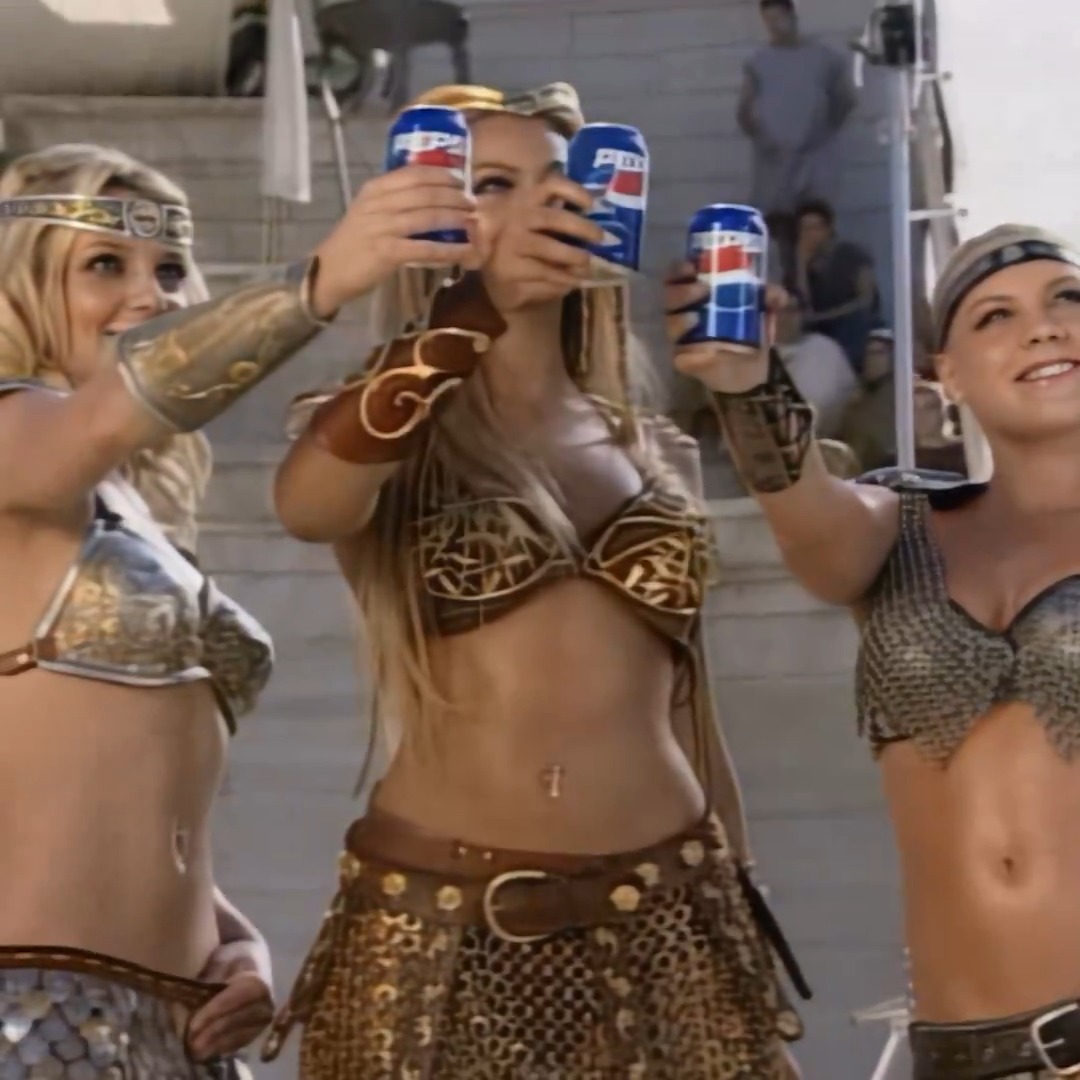 Britney Spears, Beyoncé and P!nk on set of the Pepsi Gladiator commercial, 2003.