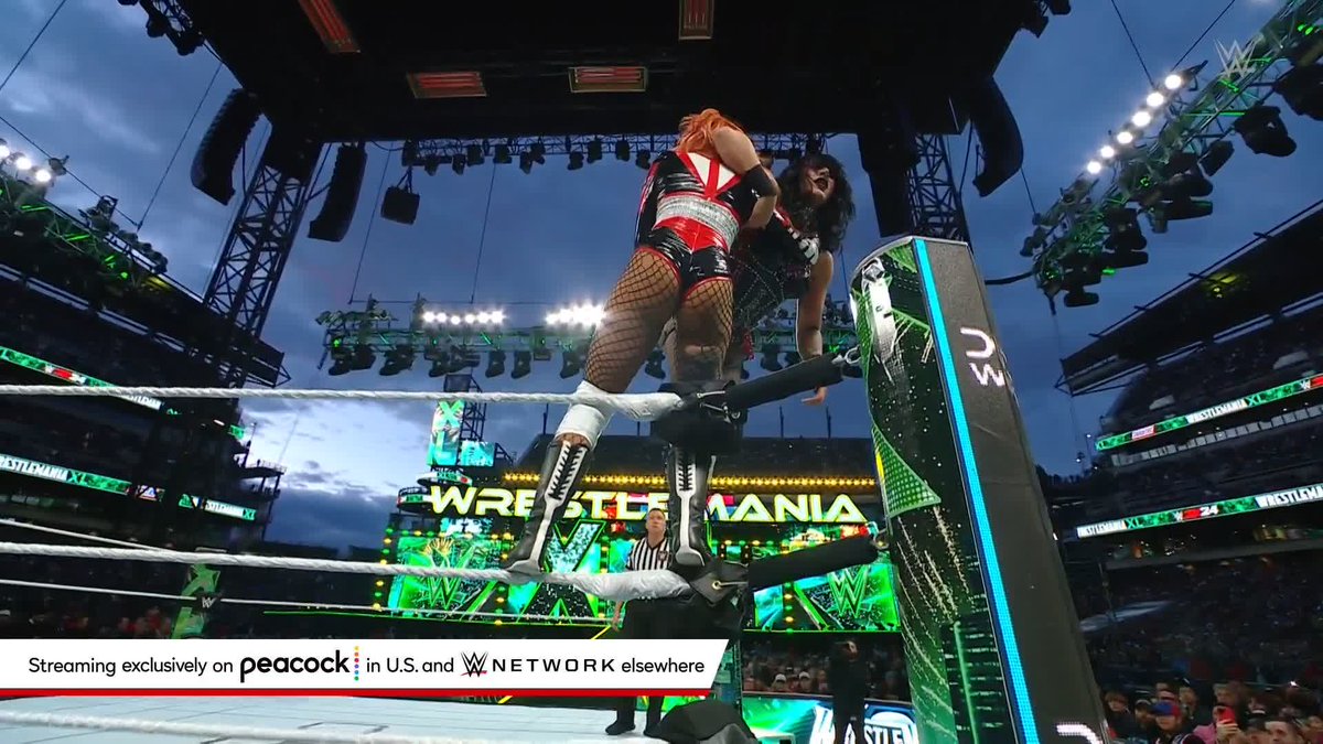 #RheaRipley rules at #WrestleMania XL! The Women's World Championship remains firmly in the grasp of MAMI.