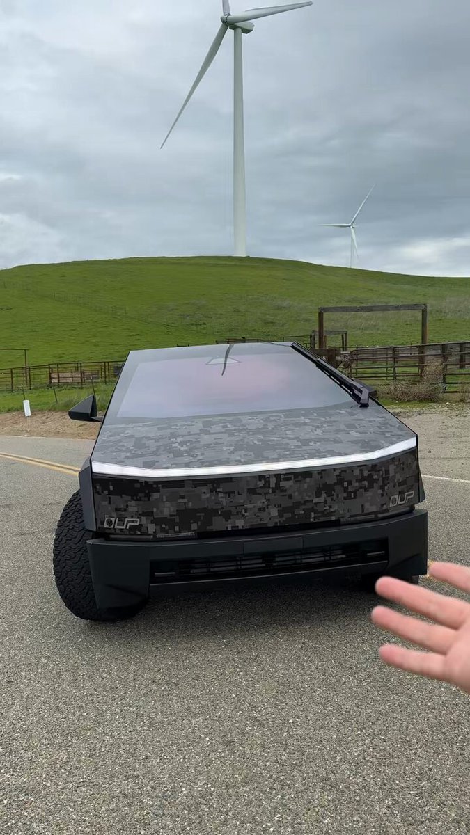 Cybertruck and Wind mills. A sustainable future.