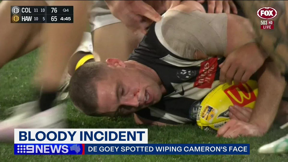A bizarre incident involving Jordan de Goey has caught the eye of the AFL when he was spotted wiping blood from Darcy Cameron's face. Tom Morris #9News