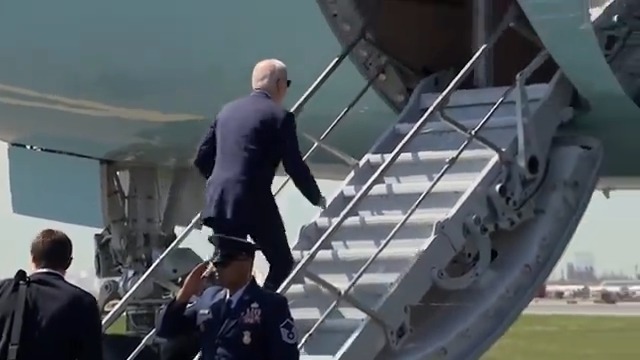 YIKES: Biden almost trips up the short stairs (again) as he heads to Wisconsin