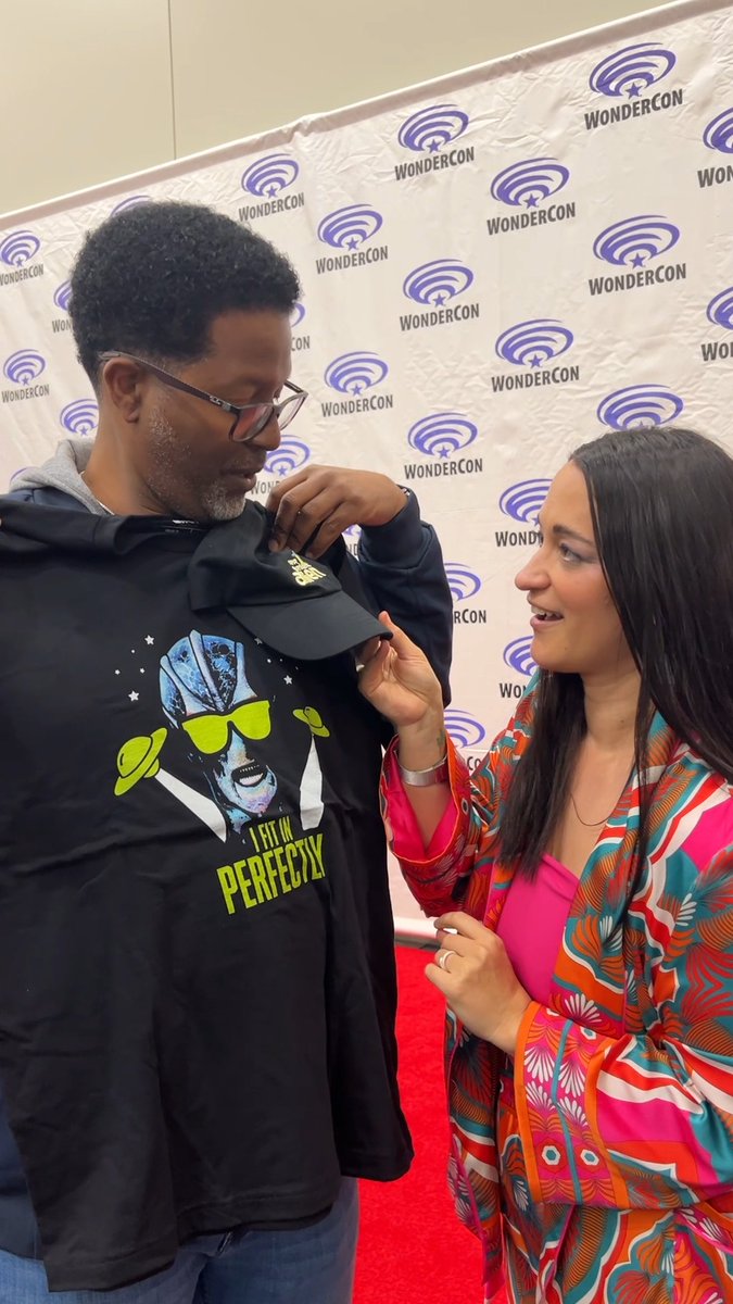 Come for the reveal of brand new #ResidentAlien merch, stay to witness @coreyreynoldsla and 🌿 Sara Tomko🌿 invent a new #ResidentAlien theme song.