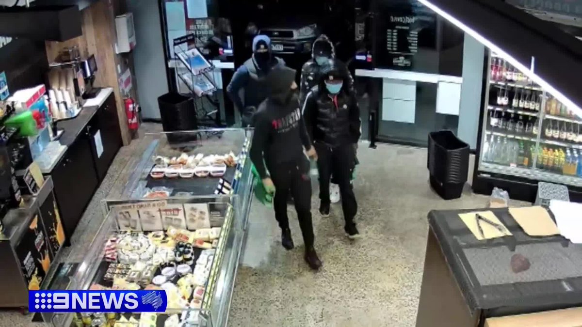 Police are hunting four armed men who stormed a supermarket in the city's eastern suburbs stealing hundreds of dollars of high-end alcohol. Julia Passarelli #9News