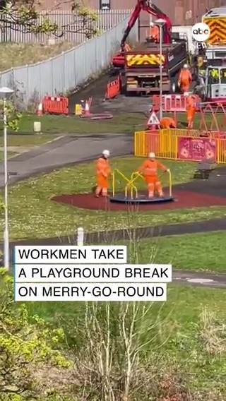 Two workers were spotted taking a well-earned break to unleash their inner child at a playground in Glasgow, Scotland.