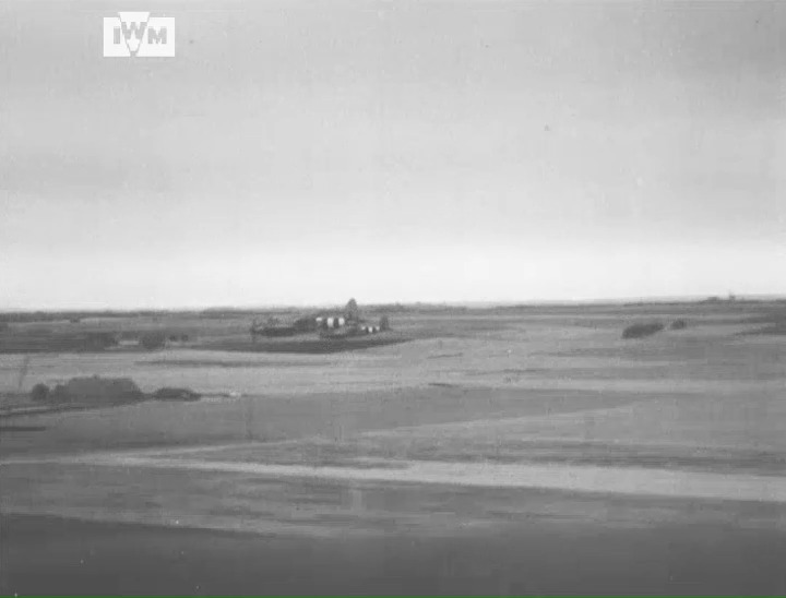 De Havilland Mosquito bombers of RAF 21 Squadron are filmed flying in to attack the Gestapo headquarters at Aarhus University, Denmark, 31 October 1944. © IWM OPF 199
