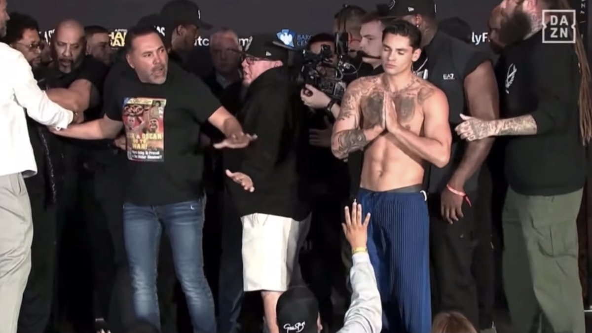 ‼️ Devin Haney's father/trainer Bill Haney clashes with Bernard Hopkins at the weigh-in while Ryan Garcia prays in front of them… [🎥 DAZN Boxing]