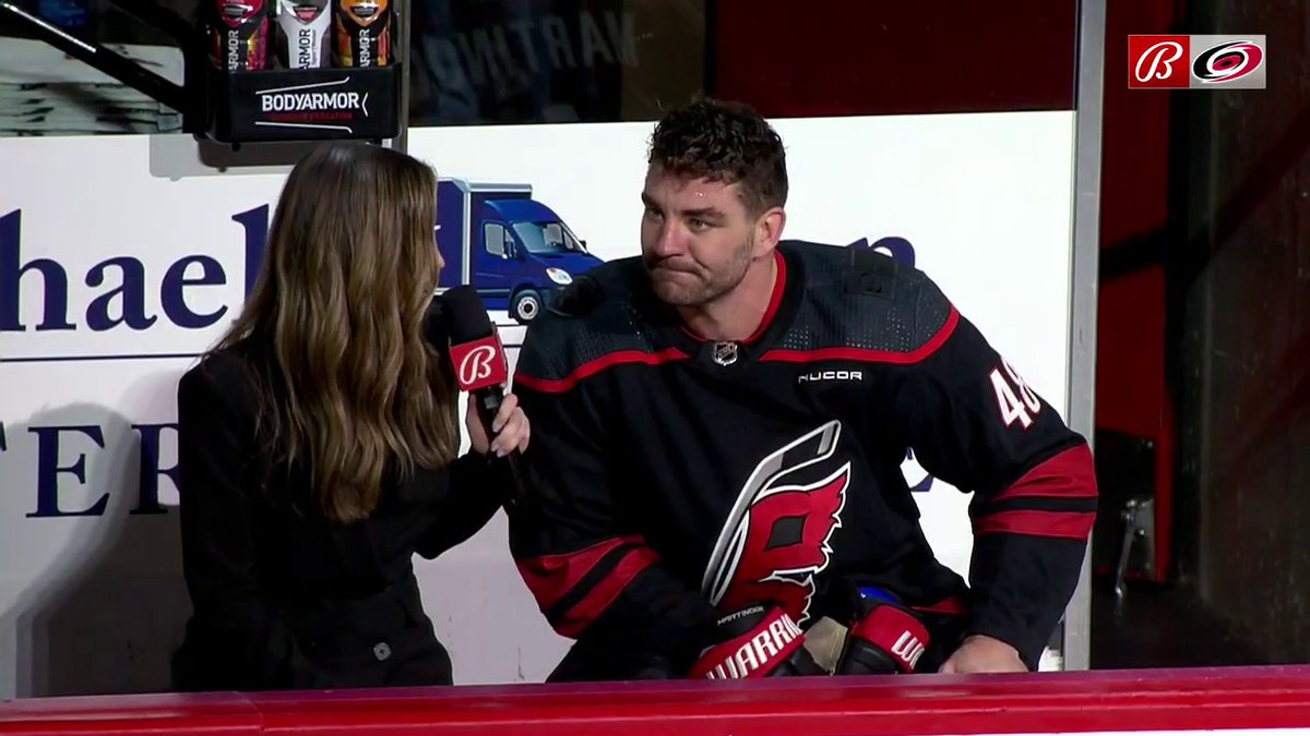 "Yeah, I can't hear you." Martinook is all energy chatting with @HannaRaeYates with a loud PNC Arena crowd! y - Carolina Hurricanes | #CauseChaos