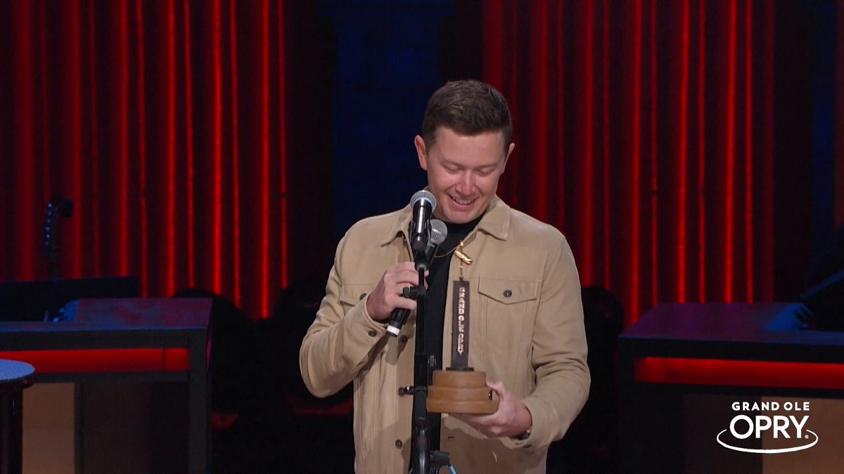 Watch the full moment where Scotty McCreery officially becomes a member of the Grand Ole Opry! Opry star Josh Turner gave a heartfelt speech alongside Randy Travis stating "country music's in great shape" with Scotty before handing him the member award! ♥️