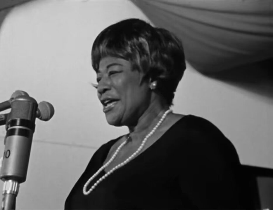 Remembering the great Ella Fitzgerald who was born on this day in 1917. Sometimes referred to as the “First Lady of Song” and “Queen of Jazz”, she was known for her purity of tone, impeccable diction, phrasing, timing, intonation and a “horn-like” improvisational ability, particularly in her scat singing. As a child, Fitzgerald wanted to be a dancer, but when she panicked at an amateur contest in 1934 at New York City’s Apollo Theatre and sang in a style influenced by the jazz vocalist Connee Boswell instead, she won first prize. During her long career Fitzgerald recorded more than 100 albums of several kinds of music. In addition to winning many Grammy awards for her recordings, Fitzgerald was honored with lifetime achievement awards by the National Academy of Recording Arts and Sciences and the Kennedy Center for the Performing Arts. Here, she is performing performing "Satin Doll" live at the Antibes Juan-les-Pins Jazz Festival in 1966.