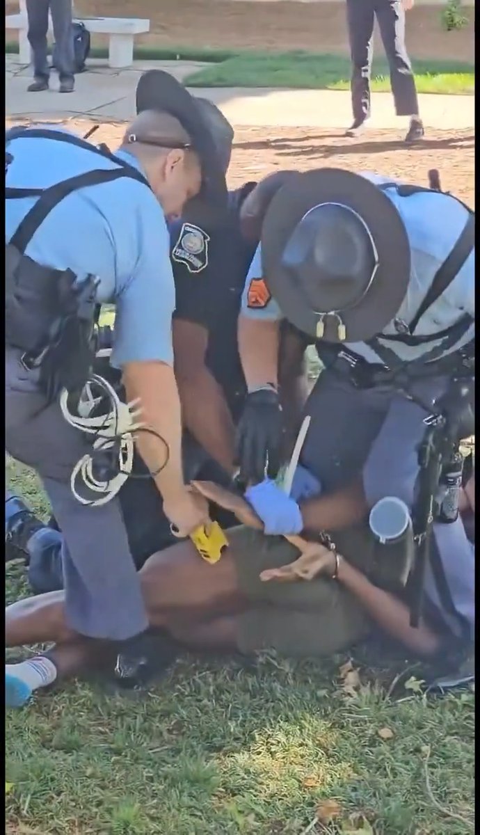 Georgia state police acting on behalf of apartheid Israel assault a handcuffed protester with a taser on the campus of Emory University